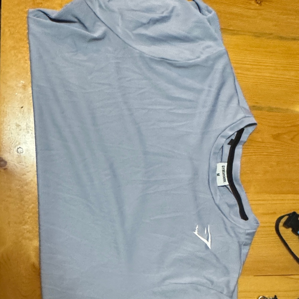Light gray T-Shirt with gymshark Logo